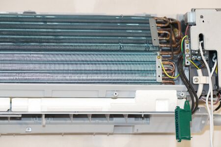 133276491-concept-of-repair-and-maintenance-of-air-conditioners-radiator-detail-with-copper-tubes-and-plates-f